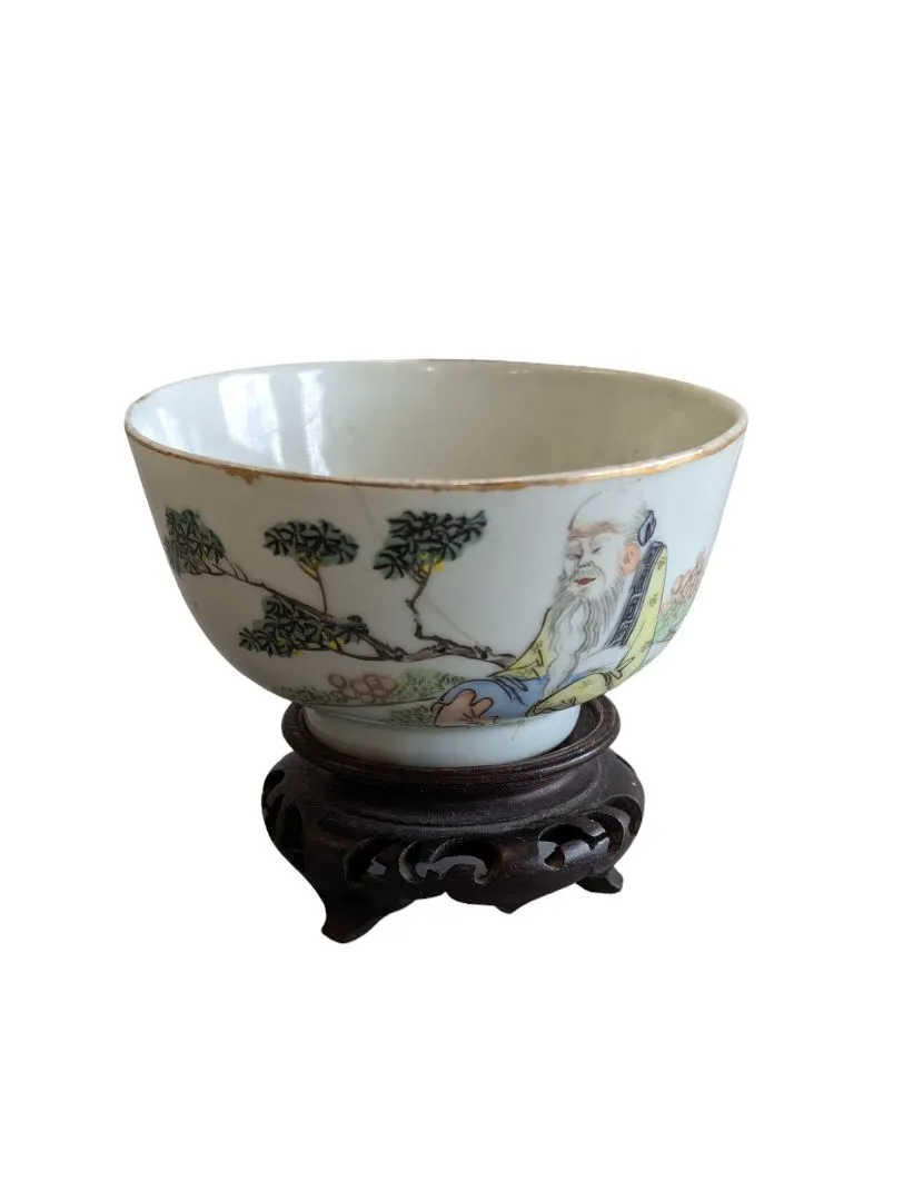 Hand-painted Chinese porcelain tea bowl is vintage.