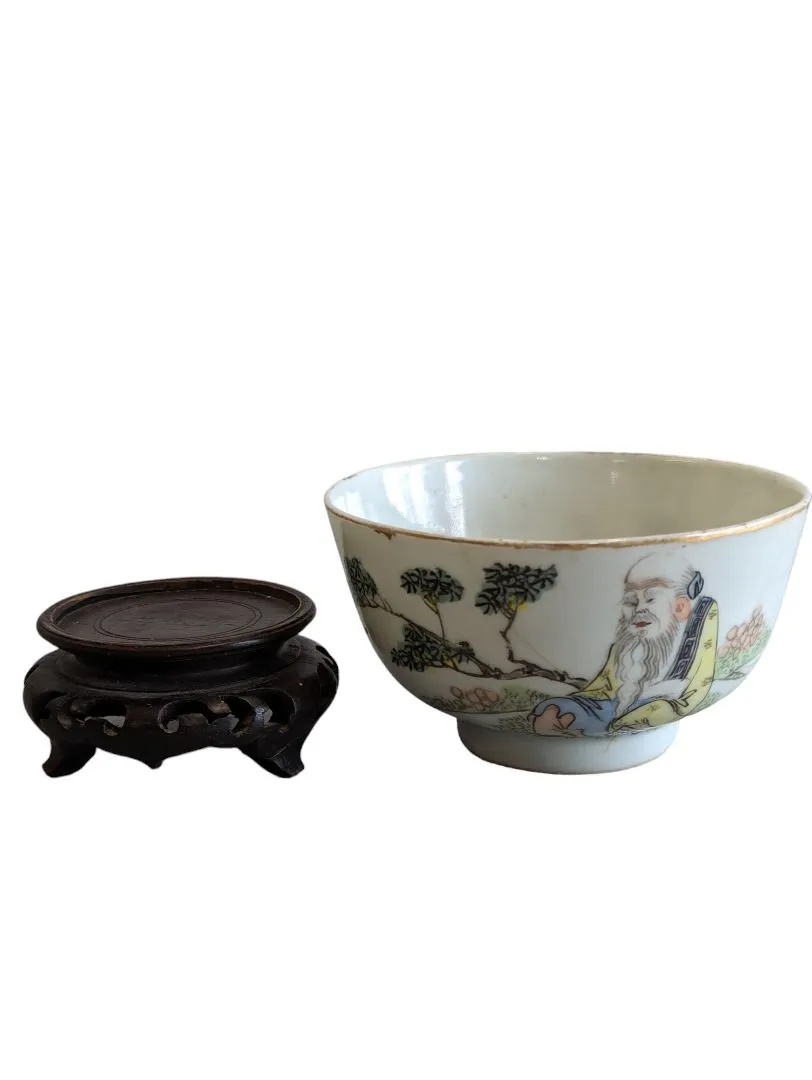 Hand-painted Chinese porcelain tea bowl is vintage.
