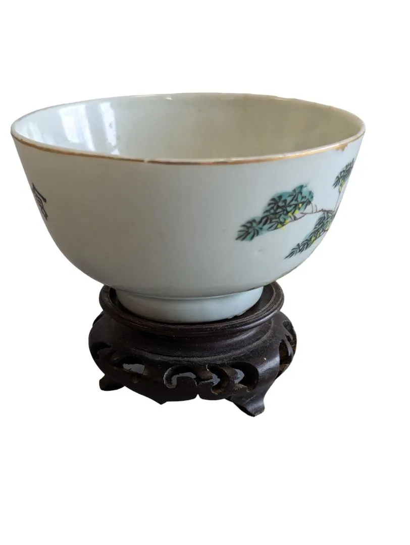 Hand-painted Chinese porcelain tea bowl is vintage.