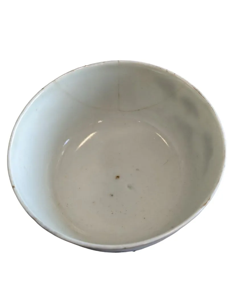 Hand-painted Chinese porcelain tea bowl is vintage.