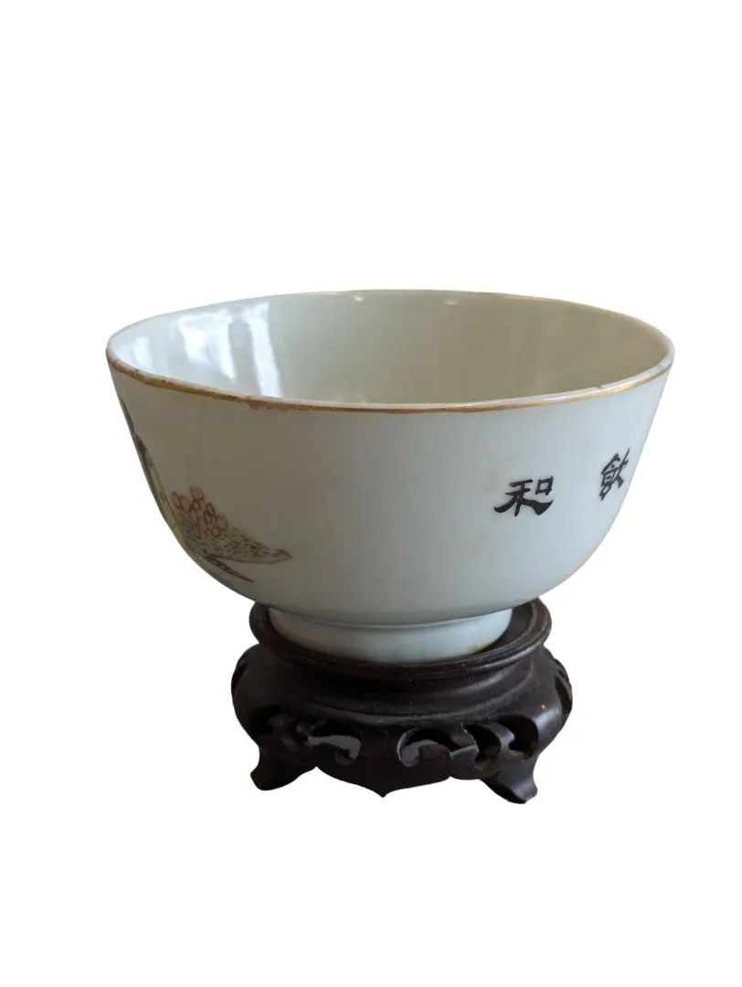 Hand-painted Chinese porcelain tea bowl is vintage.