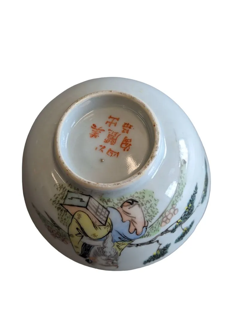 Hand-painted Chinese porcelain tea bowl is vintage.